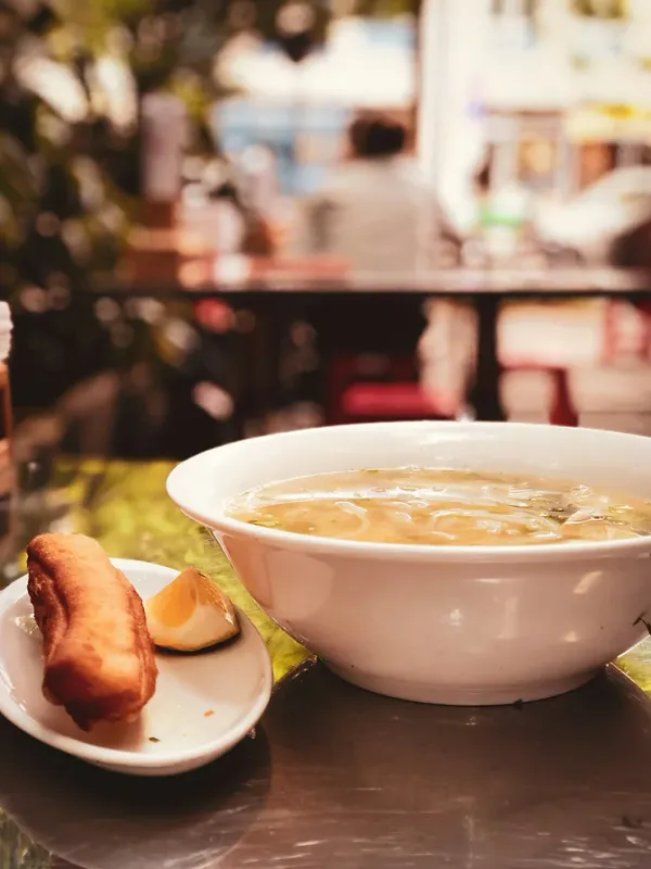 A view of the window, coffee and pho